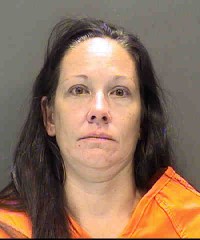 Sarasota Deputies take another person in custody at the drug flop house on Lockwood Ridge